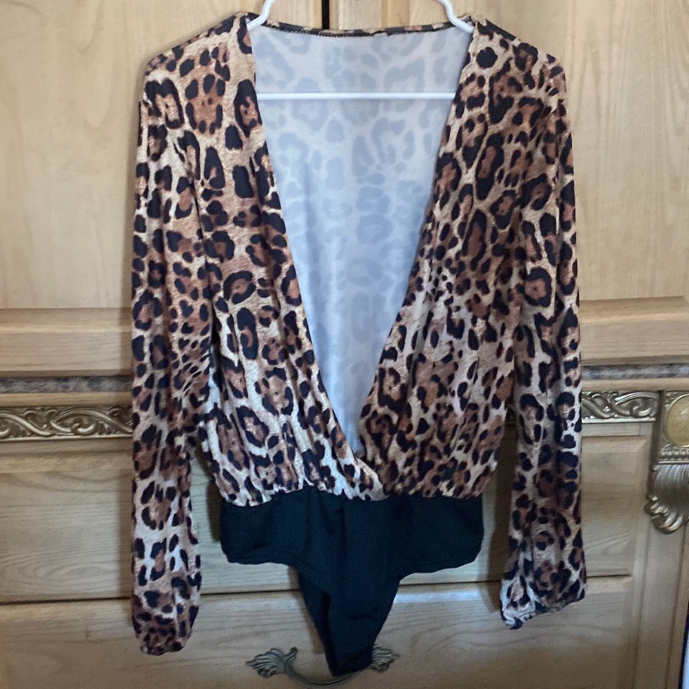Deep cut V neck leopard print blouse